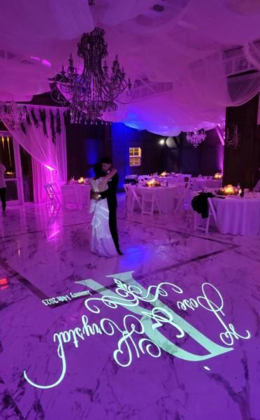 Monogram and purple uplighting 